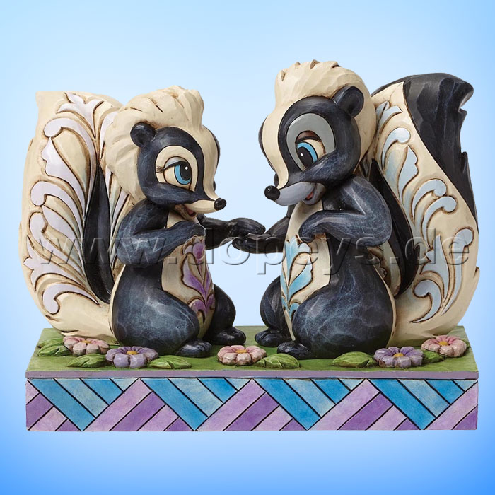 Disney Traditions / Jim Shore figurine from Enesco "Love is in the air (Flower and Miss Skunk Figurine)" 4049639.